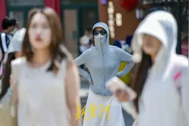 夏季热浪来袭，市民全副“捂”装防晒避高温 | 新黄河镜相图片