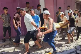 以军袭击加沙地带多处房屋和学校 已致29人死亡图片
