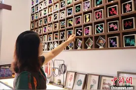 传统盘扣走进生活：一根布条“盘”出新潮流图片