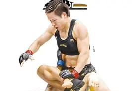 张伟丽卫冕UFC女子草量级金腰带图片
