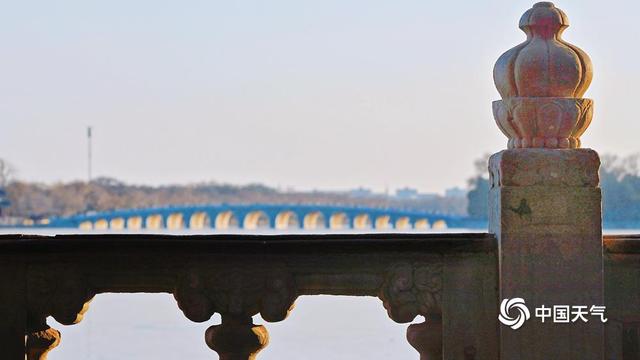 颐和园十七孔桥再迎金光穿洞 为冬日增添一抹亮色