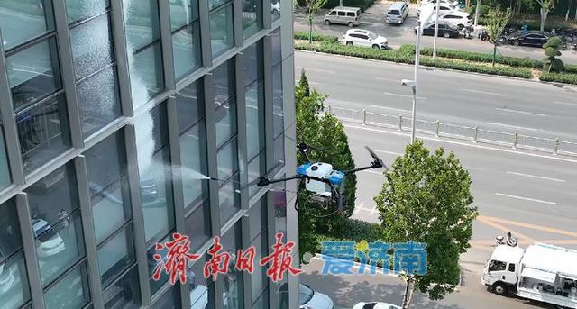6级以下风力可稳定作业 济南完成无人机玻璃幕墙清洗试验