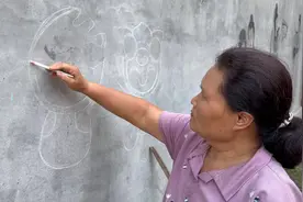上新了！山东“网红”大娘用烧火棍画出亚运吉祥物图片