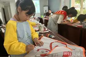 春风拂面春意暖，手绘纸鸢放蓝天图片