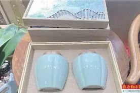 茶叶2两 包装2斤 还捆绑销售茶具图片