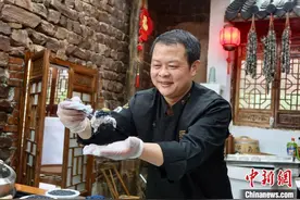（新春走基层）探黄大仙饮食文化：赤松馈青精图片