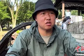 “00后”退伍军人当乌篷船船长：老船工精神很打动我图片