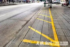 绥阳：施划非机动车停车位 绘制文明“风景线”图片