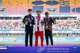 杭州亚残运会｜田径——男子400米T36级：邓培程夺冠图片