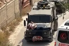 将受伤巴勒斯坦男子绑在引擎盖上带走，以军“人盾”事件引多方愤怒！图片