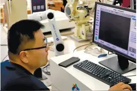 “他们”何以成功“走”出实验室？——“探访机器人产业进阶路”系列报道之一图片