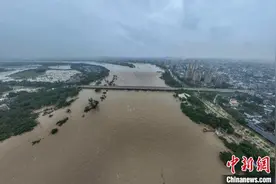 直击海南琼海洪涝灾区：农田村庄被淹 洪水涌进城市图片
