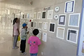 “书写方块字·中华美少年”黄渤海新区图书馆少儿书法展开展图片