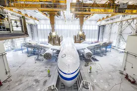 C919飞机首次“身披”五星红旗！揭秘涂装全过程图片