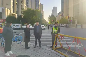 着力解决道路安全隐患 维护校园周边交通秩序图片