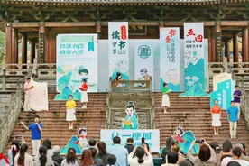 图片新闻｜万盛：街头读书分享会 共沐书香阅人生图片