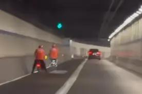 深夜的上海越江隧道，为何时有非机动车违法闯禁？记者实探图片