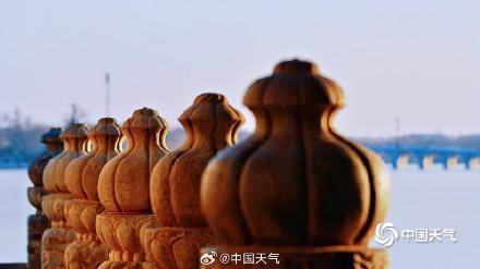 颐和园十七孔桥再现金光穿洞 为冬日增添一抹亮色