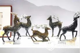 我市金钱石雕作品《鹿祥五瑞》荣获金奖图片
