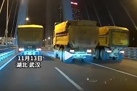 三辆渣土车高架并行被交警处罚：小车只能龟速跟在后面图片