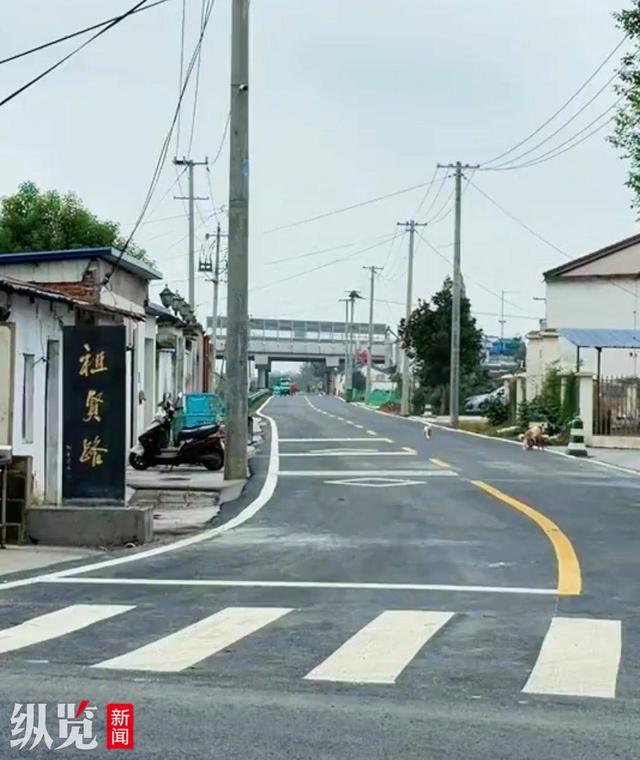 王祖贤30年前捐建的路升级改造竣工