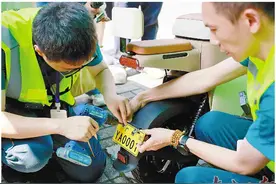 广州开始发放电动自行车专用号牌图片