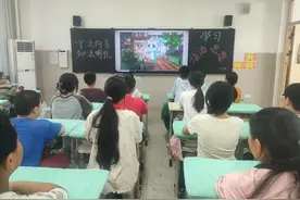 五里堡小学召开法制教育主题班会图片