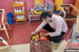 （新春走基层）台胞返乡过年的“行李箱”：装得下特产，搬不走文化图片