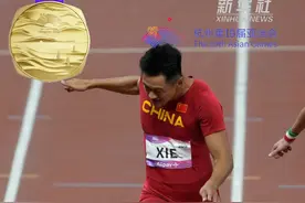 夺金瞬间｜田径——谢震业获得男子100米金牌图片