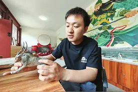 90后小伙巧用面团塑出《山海经》神兽图片