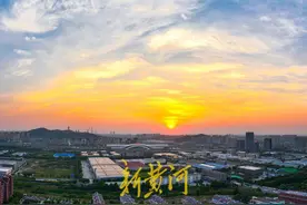 初夏的济南，摩天轮与夕阳“共舞” | 新黄河AI原创音乐图片