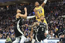 （体育）篮球——NBA常规赛：湖人胜雄鹿图片