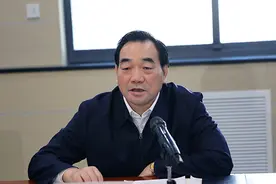 周铁根被查图片