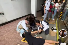 一男子在上海地铁站内倒地抽搐，三女子紧急施救被网友点赞图片