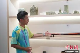 （杭州亚运会）文化屋里的“小青荷”：以“文”会友 成为文化传播一扇窗图片