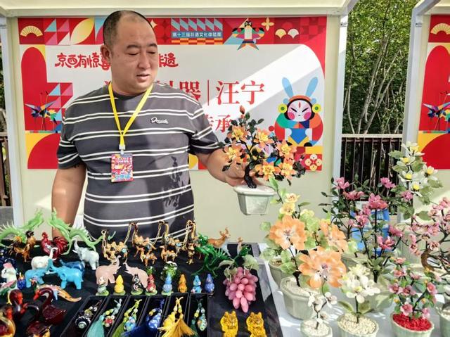 假期新玩法：非遗体验周亮相雕塑公园