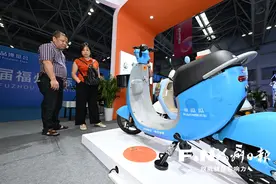 记者探访数博会：无人机为建筑体检 电动车能无线充电图片