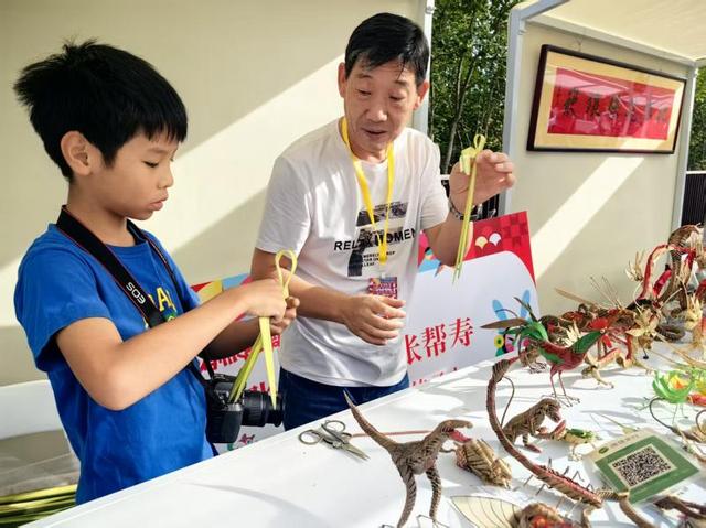 假期新玩法：非遗体验周亮相雕塑公园
