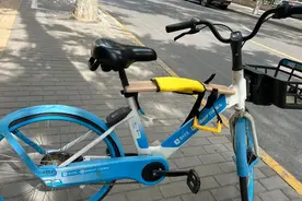 共享单车儿童座椅，得先迈过安全关 | 新京报社论图片