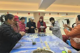 锦绣中国年丨广西南宁：一个社区15个民族群众共绘幸福年图片