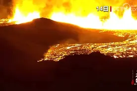 果然视频·看天下|冰岛火山喷发，岩浆涌入小镇图片