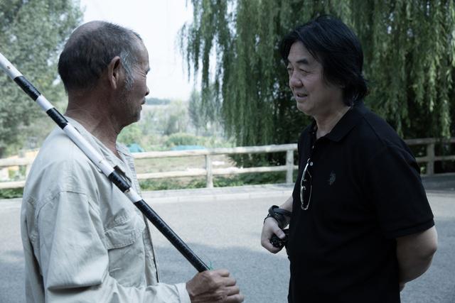 新窑子三十年：一个摄影师与一个村庄的“纠缠”