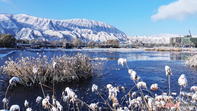 初雪落永靖 山河入画来