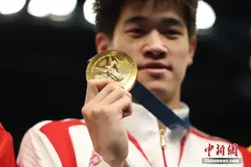 潘展乐：从“看台观战”到世界之巅图片