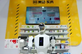 美团去年营收增长22%，王兴：美团AI唯一策略是进攻图片