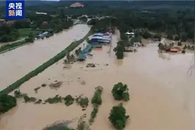 马来西亚强降雨引发多地洪灾 超12.2万人撤离图片