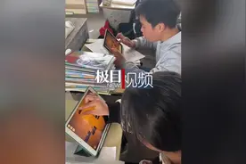 湖南一教师花光12万元购车预算，买37台电脑给学生用图片