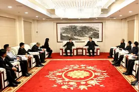 丁小强与工商银行山西分行行长杨志忠座谈图片