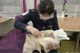 K306/7次列车列车员顺利解救被拐婴儿图片