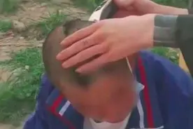 官方回应“居民私自外出被志愿者剃头”：系恶搞，已对3人批评教育图片